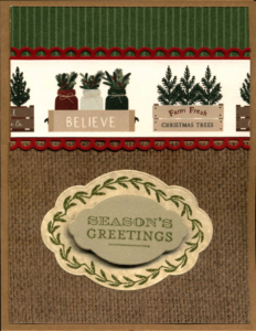 Festive holiday greeting card with text 'Season's Greetings' on a burlap background.