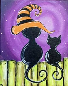 Two black cats with curly tails sit on a green wooden fence against a purple starry sky