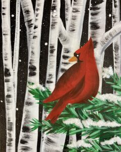 A red cardinal on a snow-covered branch, set against birch trees and a snowy night sky.